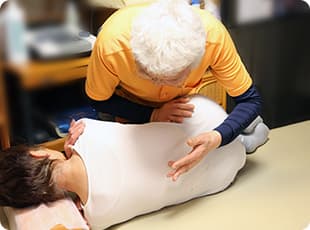 仙骨・腰椎の調整